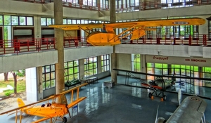 AirforceMuseum_Glider_and_old_plans_in_hall.jpg