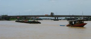 m_Dirt_Barges_Heading_Down_River.jpg